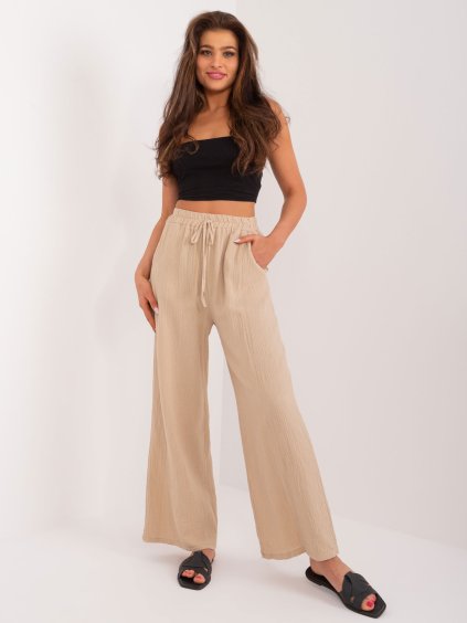 Bézs széles szövet nadrág zsebekkel