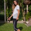 Női 3/4-es fekete leggings kakas mintával