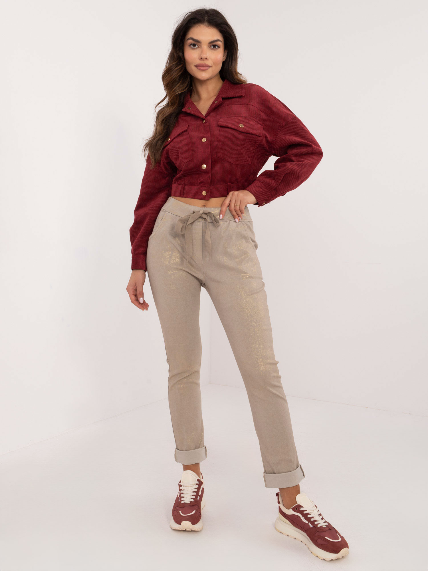 Dámske smotanové lesklé nohavice so zaväzovaním v páse DHJ-SP-21258.32-ecru Veľkosť: ONE SIZE