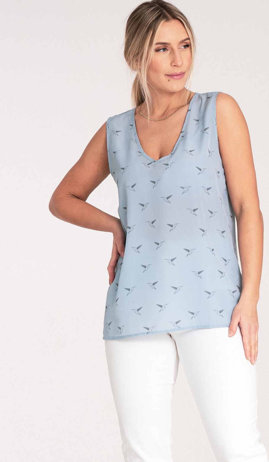 Dámska svetlomodrá blúzka so vzormi M1076 Light blue Veľkosť: S