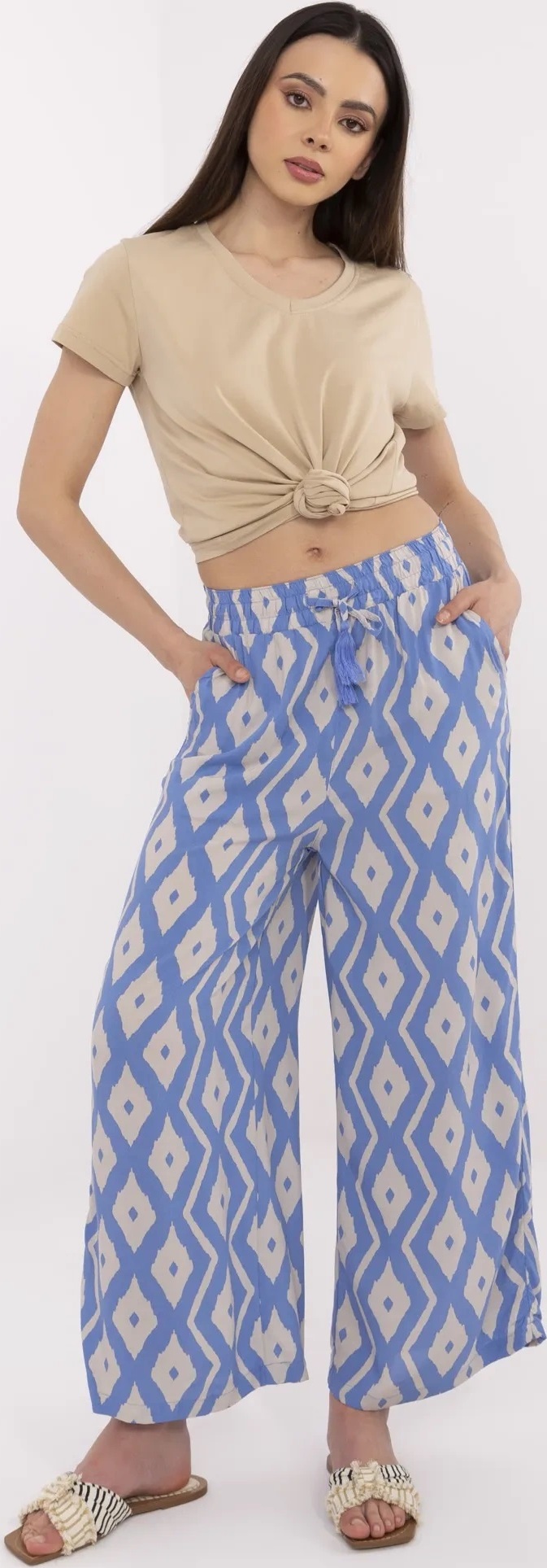 Modré dámske vzorované letné nohavice z viskózy D73771M62237H-blue Veľkosť: XS