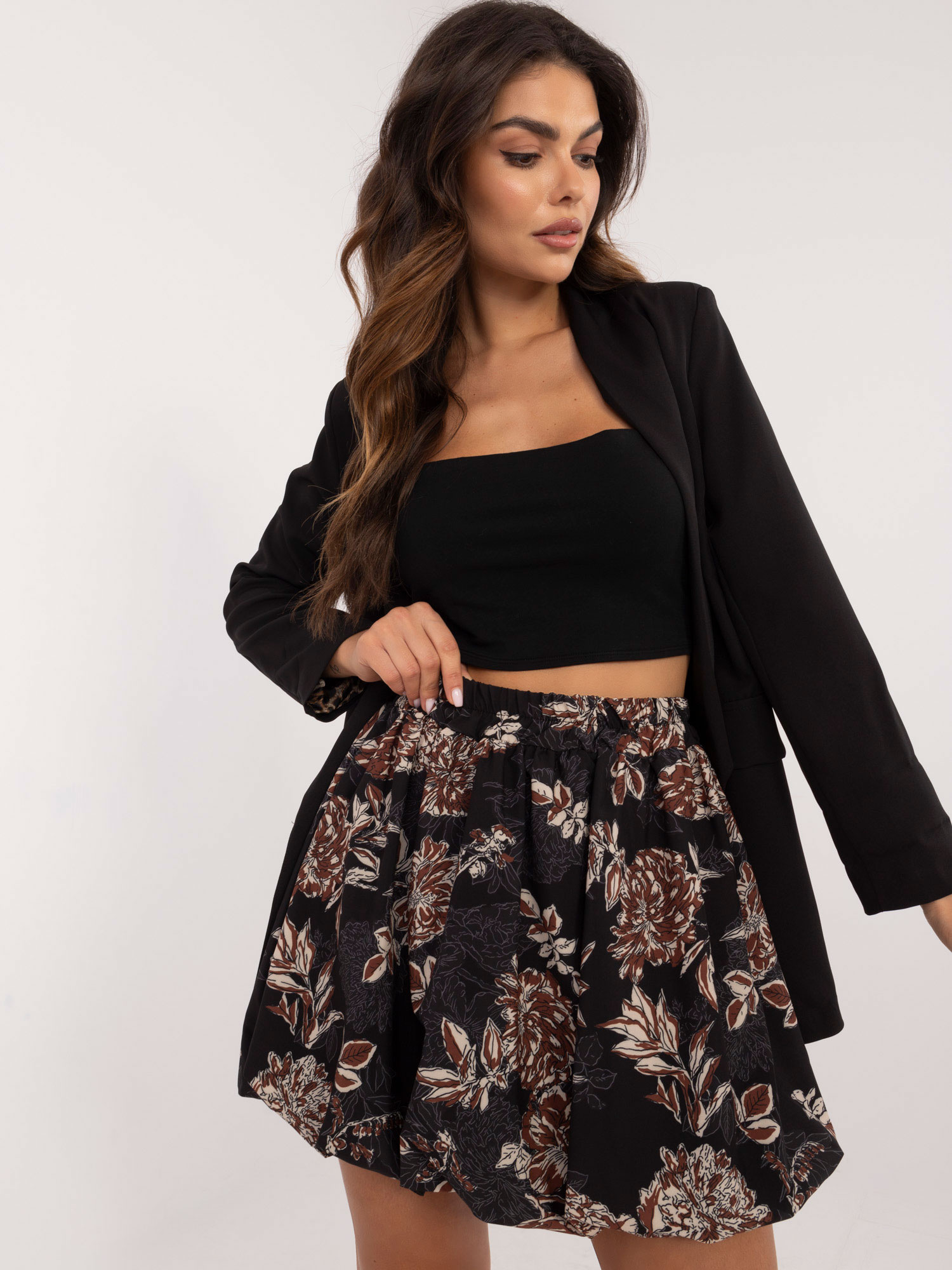 Černá dámská mini sukně s květinovým potiskem DHJ-SD-19865-6.54P-black Veľkosť: ONE SIZE