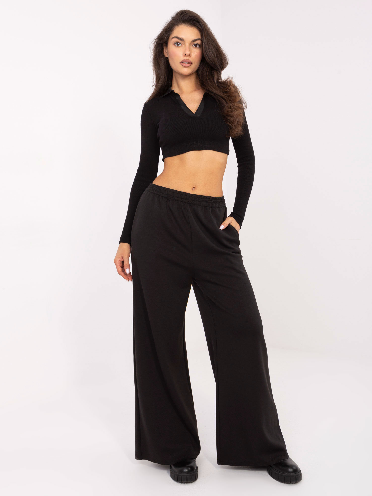 Čierne dámske široké viskózové tepláky s vreckami IT-SP-21559.75-czarny Veľkosť: ONE SIZE