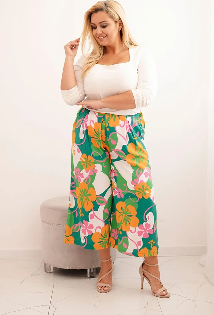 Oranžové dámske plus size nohavice z viskózy s kvetinovým vzorom Veľkosť: ONE SIZE