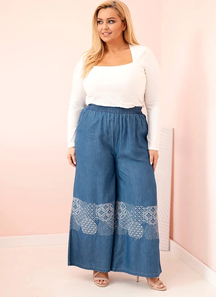 Modré dámske plus size nohavice so širokými nohavicami a výšivkou Veľkosť: ONE SIZE