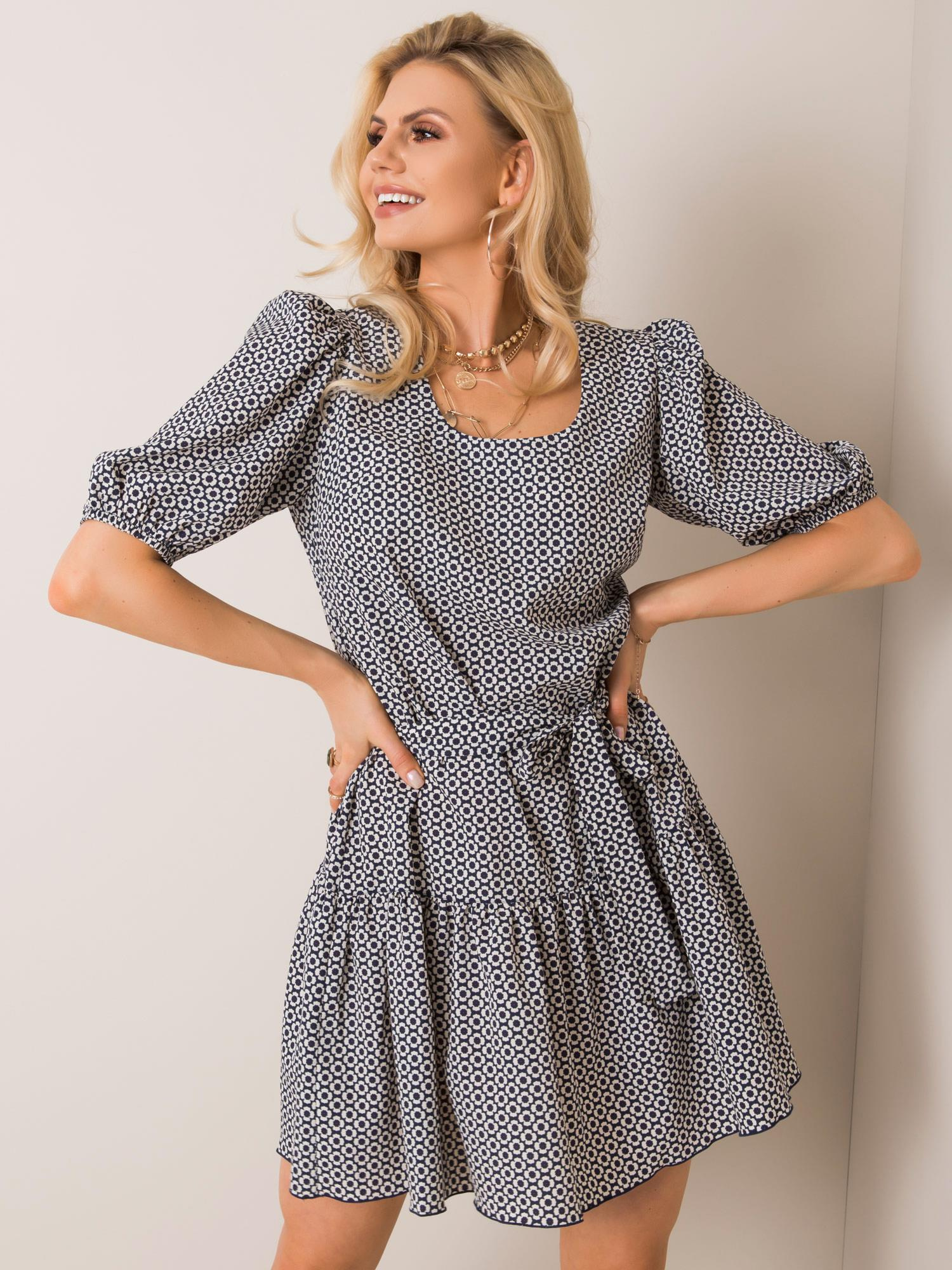 Dámske tmavo modré šaty s motívom malých kvetín LK-SK-508151.34P-dark blue-white Veľkosť: 38