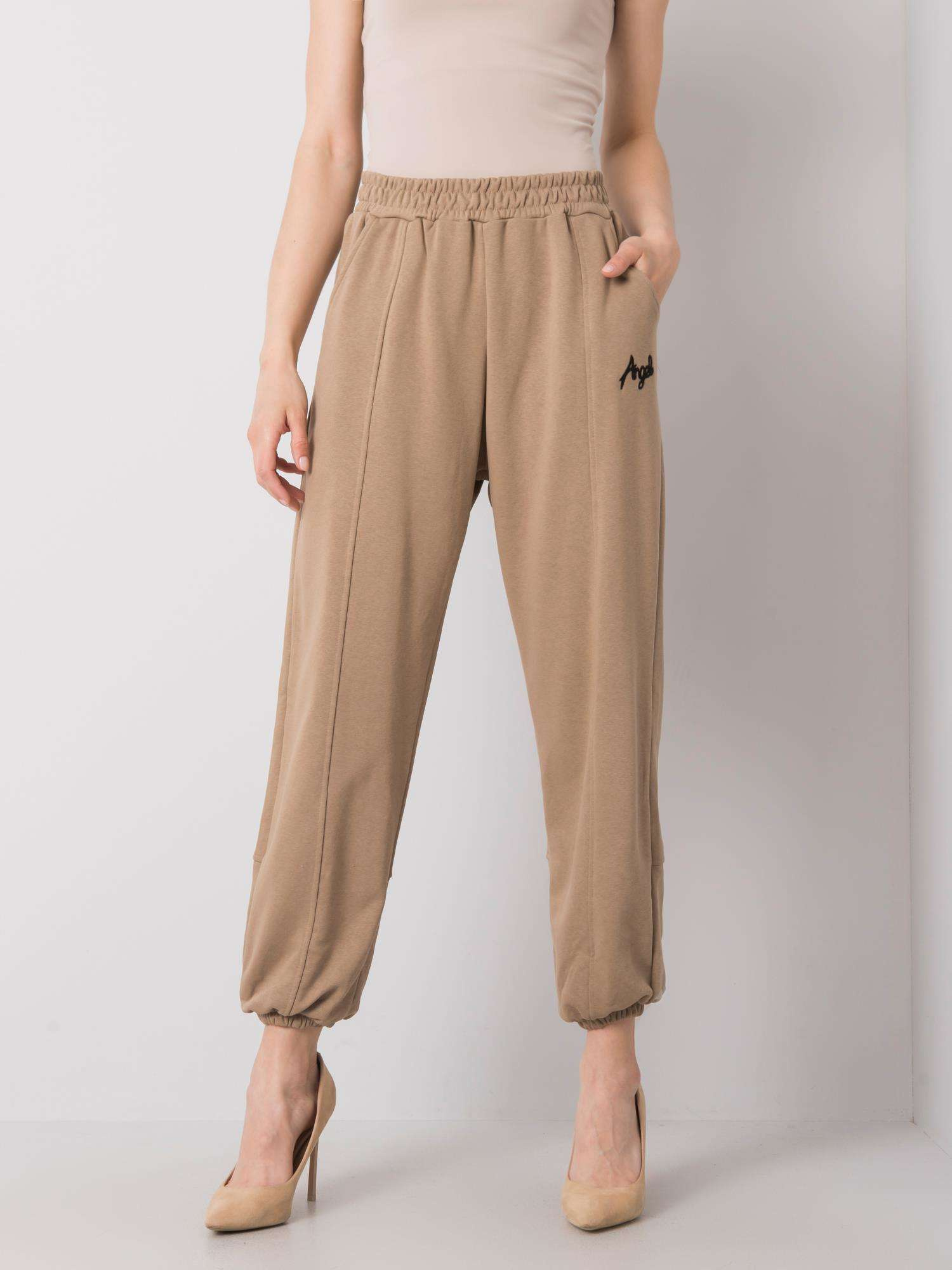 Béžové dámske voľné tepláky EM-DR-ES-21-524.16-beige Veľkosť: L