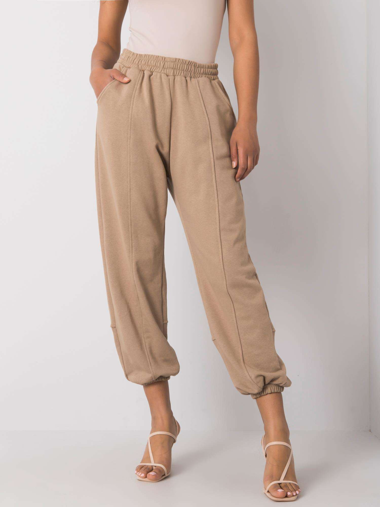 Béžové dámske tepláky EM-DR-ES-21-535.20-beige Veľkosť: M