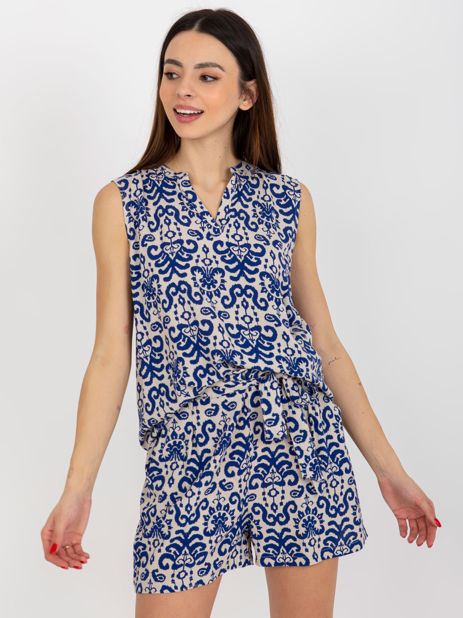 Tmavomodrá blúzka so vzorom bez rukávov D73771R11115A-dark blue Veľkosť: M