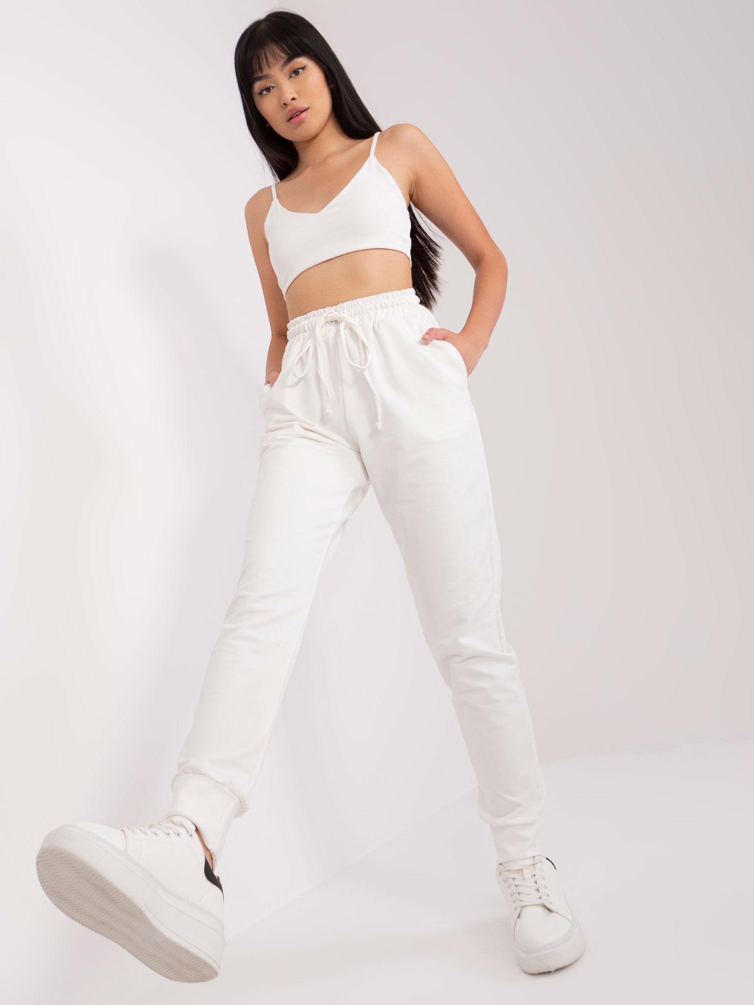 Smotanové dámske tepláky -LK-SP-508922-1.30X-ecru Veľkosť: L/XL