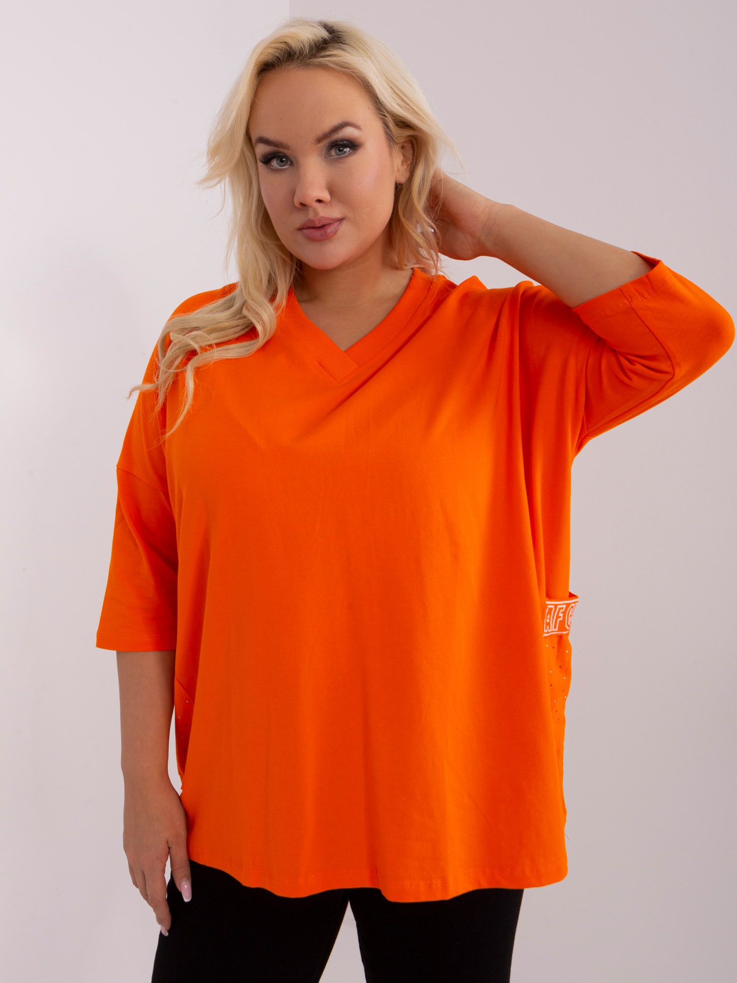 ORANŽOVÉ VOĽNÉ TRIČKO S VRECKAMI RV-BZ-7783.99-ORANGE Veľkosť: ONE SIZE