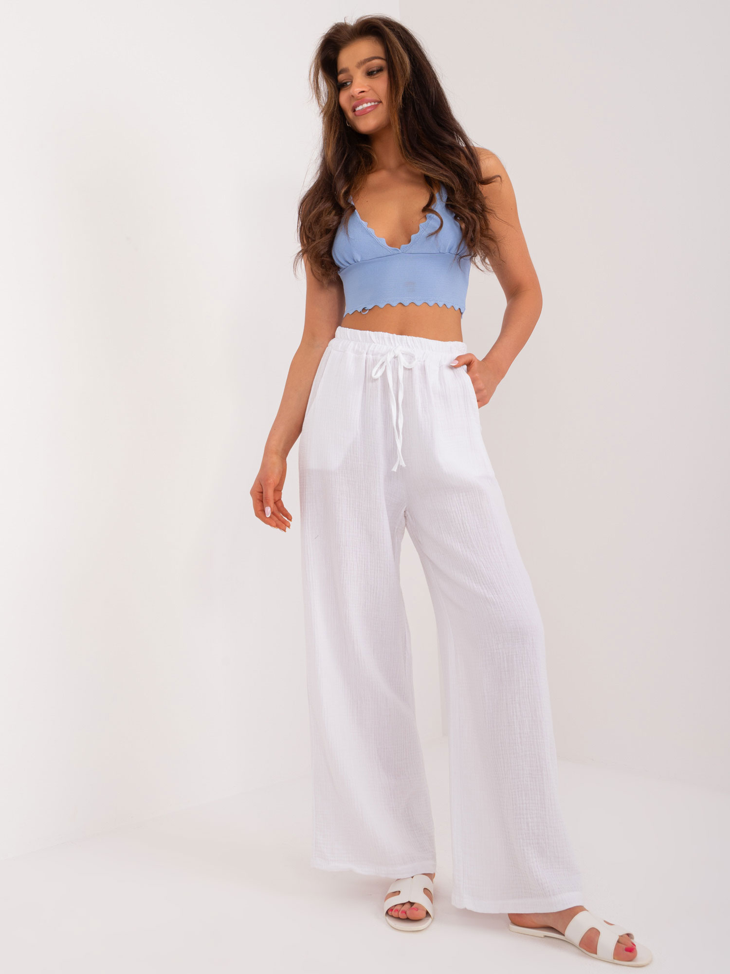 Biele široké látkové nohavice s vreckami DHJ-SP-8229.84-white Veľkosť: ONE SIZE