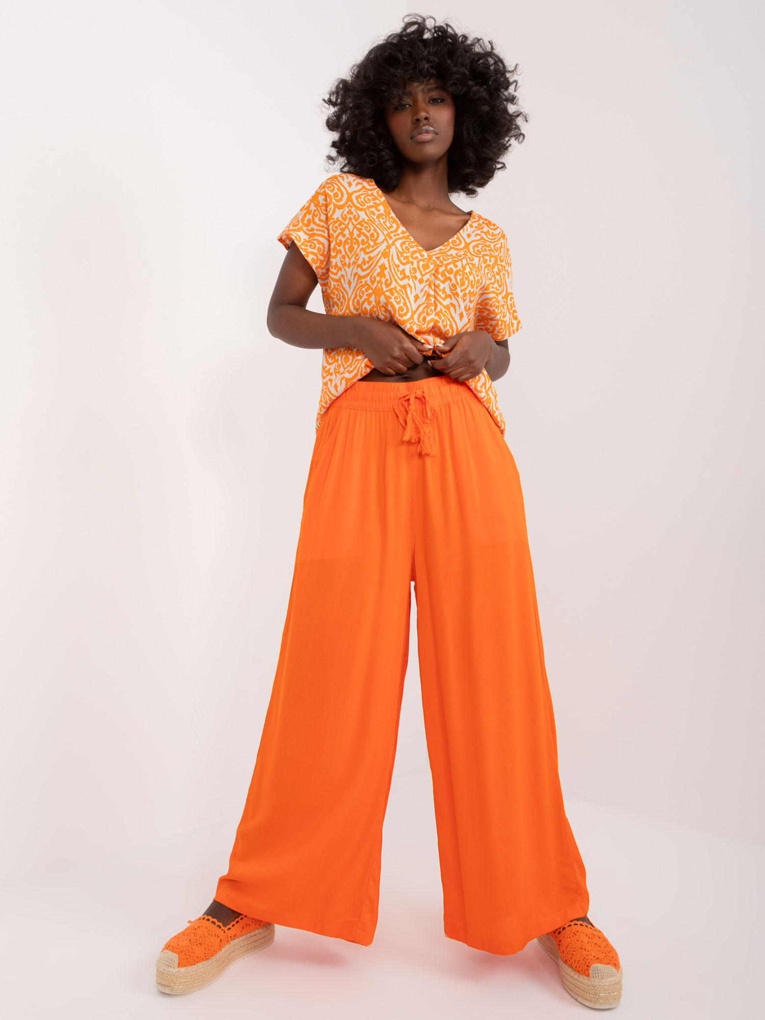 Oranžové široké letné nohavice D73761M62237D-orange Veľkosť: XS