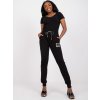 Čierne slim fit tepláky s kamienkami