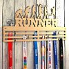 Držák na medaile Evolution of runner