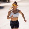 Female runner wearing LosReyes Mercury silver mirrored sunglasses