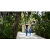 anantara veli maldives resort spa exterior view team members walking 1920x1037
