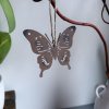 Kovový antik motýl k zavěšení