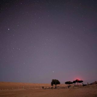 When I was sitting in the desert at night, looking up at the sky filled with thousands of stars, time suddenly slowed...