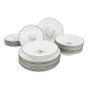 18dílná jídelní souprava Nová Vánoční Nostalgie s upraveným dekorem 2025. Smetanový porcelán s vánočními motivy a šedým lemem pro sváteční stolování.
