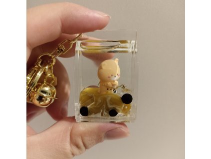 Medvídek v hnědé tekutině - krabička