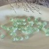 Skleněné korálky – polobílé glazované - světle zelená - ø 8 mm