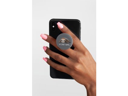 mockup of a hand holding a phone with a phone grip on a plain background 28169 (2)