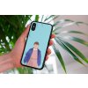 mockup of a woman holding a clear phone case in front of a houseplant 4636 el1 (7)