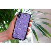 mockup of a woman holding a clear phone case in front of a houseplant 4636 el1 (9)
