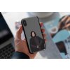mockup of a man holding a clear phone case 4638 el1