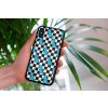 mockup of a woman holding a clear phone case in front of a houseplant 4636 el1