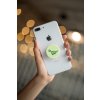 phone grip mockup with string lights in the background 22146