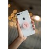 phone grip mockup with string lights in the background 22146