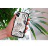 mockup of a woman holding a clear phone case in front of a houseplant 4636 el1 (97)