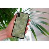 mockup of a woman holding a clear phone case in front of a houseplant 4636 el1 (69)