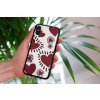 mockup of a woman holding a clear phone case in front of a houseplant 4636 el1 (57)