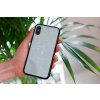 mockup of a woman holding a clear phone case in front of a houseplant 4636 el1 (79)