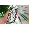mockup of a woman holding a clear phone case in front of a houseplant 4636 el1 (53)