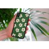 mockup of a woman holding a clear phone case in front of a houseplant 4636 el1 (61)
