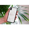 mockup of a woman holding a clear phone case in front of a houseplant 4636 el1 (2)