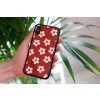 mockup of a woman holding a clear phone case in front of a houseplant 4636 el1 (62)