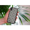 mockup of a woman holding a clear phone case in front of a houseplant 4636 el1 (58)