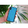 mockup of a woman holding a clear phone case in front of a houseplant 4636 el1 (3)