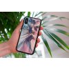 mockup of a woman holding a clear phone case in front of a houseplant 4636 el1 (6)