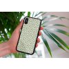 mockup of a woman holding a clear phone case in front of a houseplant 4636 el1 (60)