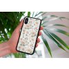 mockup of a woman holding a clear phone case in front of a houseplant 4636 el1 (90)