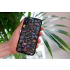 mockup of a woman holding a clear phone case in front of a houseplant 4636 el1 (6)