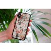 mockup of a woman holding a clear phone case in front of a houseplant 4636 el1 (18)