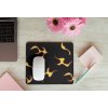 mousepad mockup over a wooden surface by some flowers and a laptop 27560