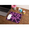 mockup of a mousepad lying on a rustic table next to a flower vase 27554